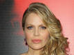 Kristin Bauer Van Straten auctioning...