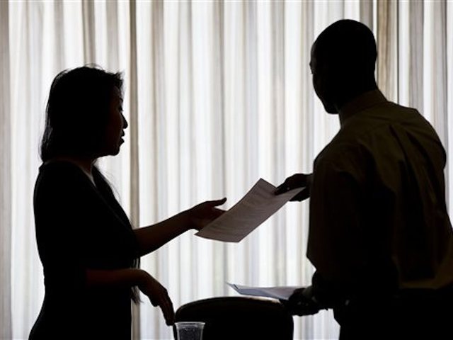 US adds a modest 164,000 jobs; unemployment down to 3.9 pct.