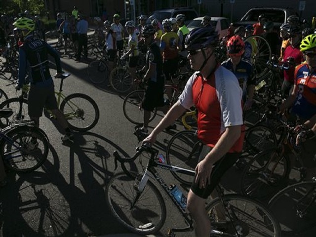 Driver of pickup charged with murder in bicyclists' deaths