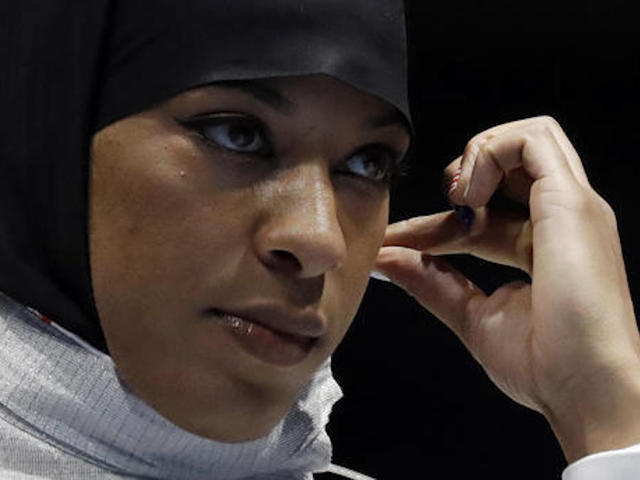 Ibtihaj Muhammad becomes first woman to compete in Olympics with hijab