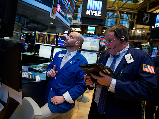 Dow soars 300 points, closes above 21,000 for the first time