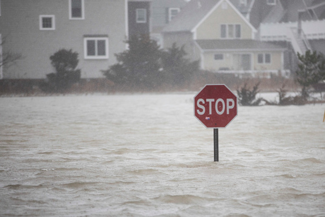 'Bomb cyclone' pounds east coast with heavy flooding, high winds