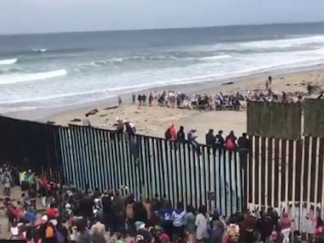 Migrants who traveled with caravan vow to wait at border until they are granted asylum
