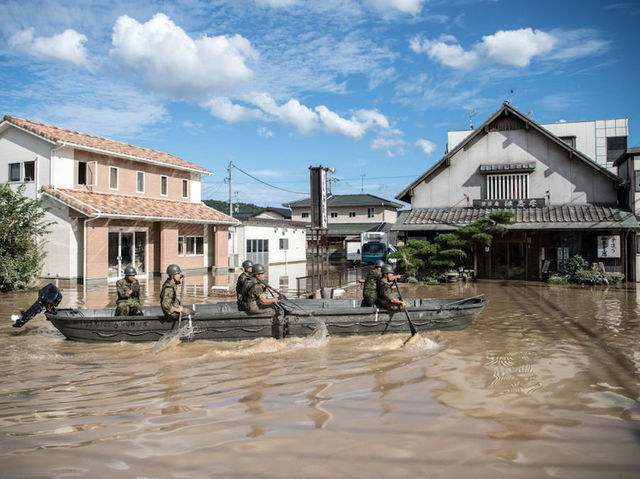 Japan floods: At least 100 dead after heavy rain and landslides