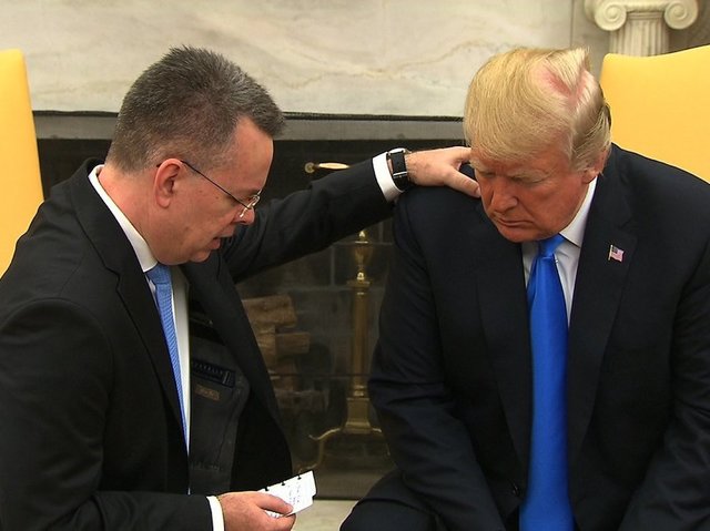 Released US pastor Andrew Brunson returns to US, meets with Trump